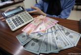 Key Discussion: Rupiah Ditutup Melemah Meski BI Sudah Naikkan Suku Bunga Jadi 5,75%