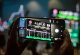 IHSG Berpotensi Lanjutkan Penguatan, Analis Jagokan Saham ANTM, DEWA hingga BUMI